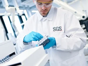 SGS laboratory technician testing chemical properties of spray adhesive samples